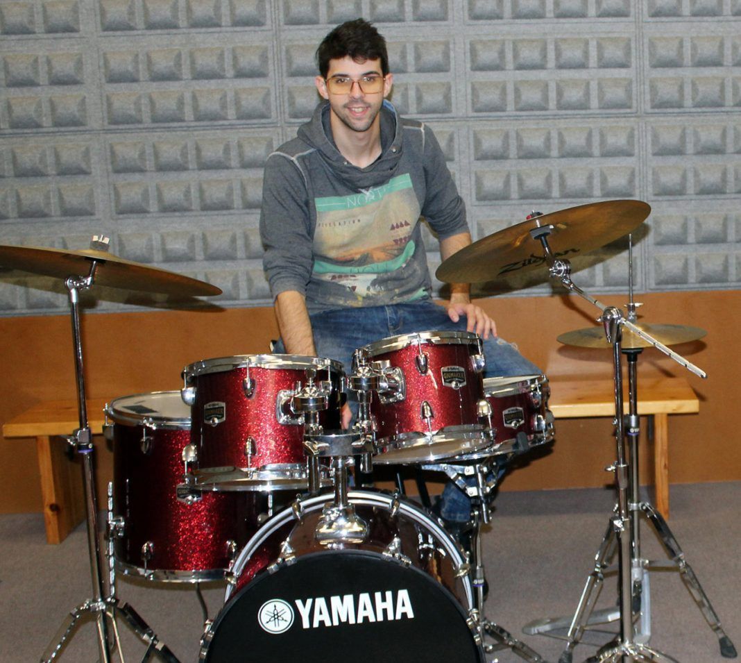 Jesús, with one of his studio instruments. Jesús brings his own saxophone for the ensemble pieces